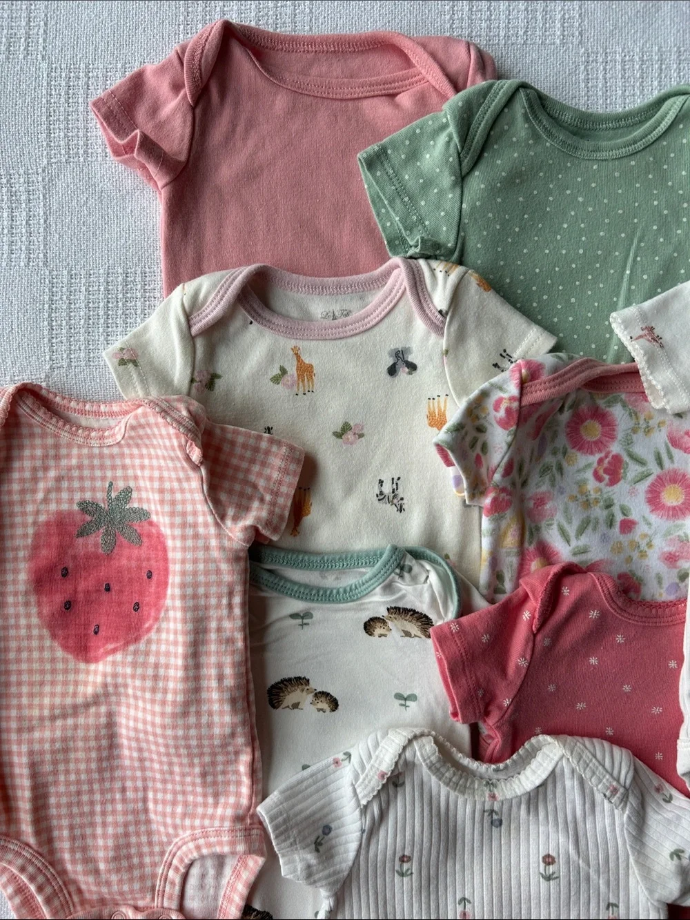 9 Girls Onesies size 0-3 months